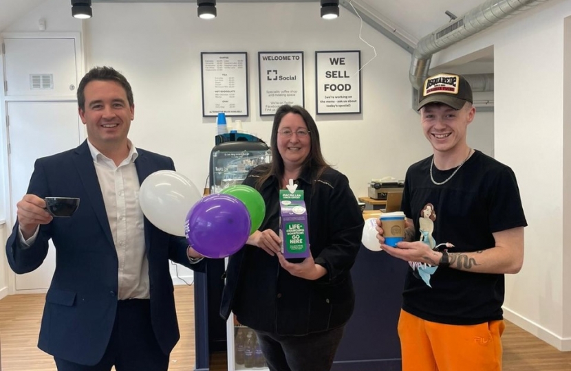 MP raises a mug for Macmillan  