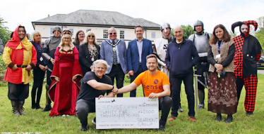 Property Developer Raises Funds for Sense Charity with Medieval-Themed March